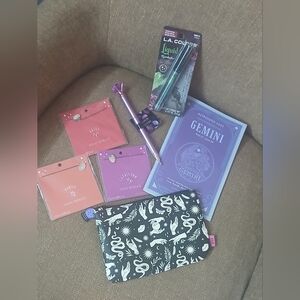 7: horoscope- 3 necklaces, book, ipsy pouch, liquid eyeshadow,pen